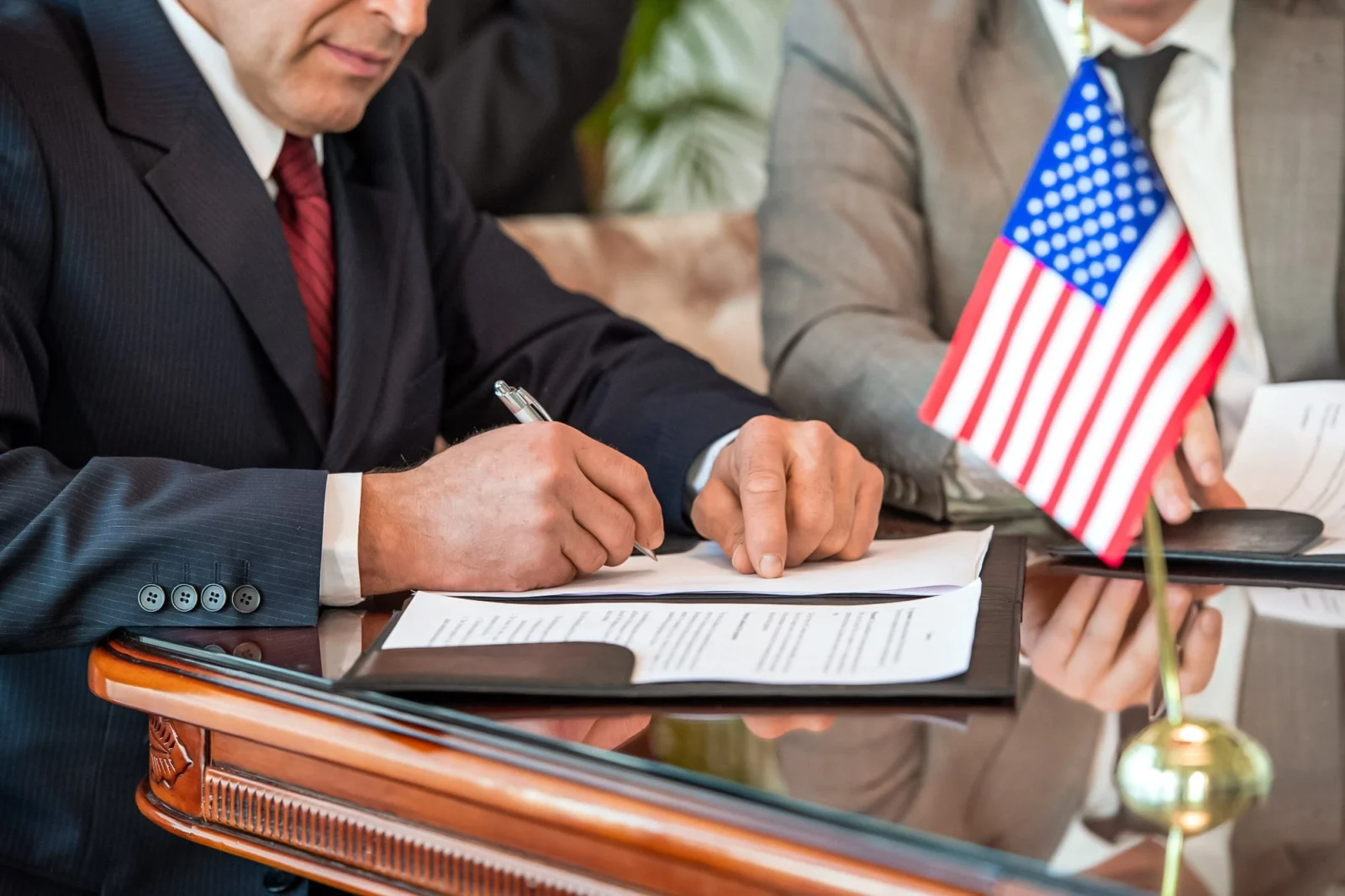 government signing the document solar tax credit